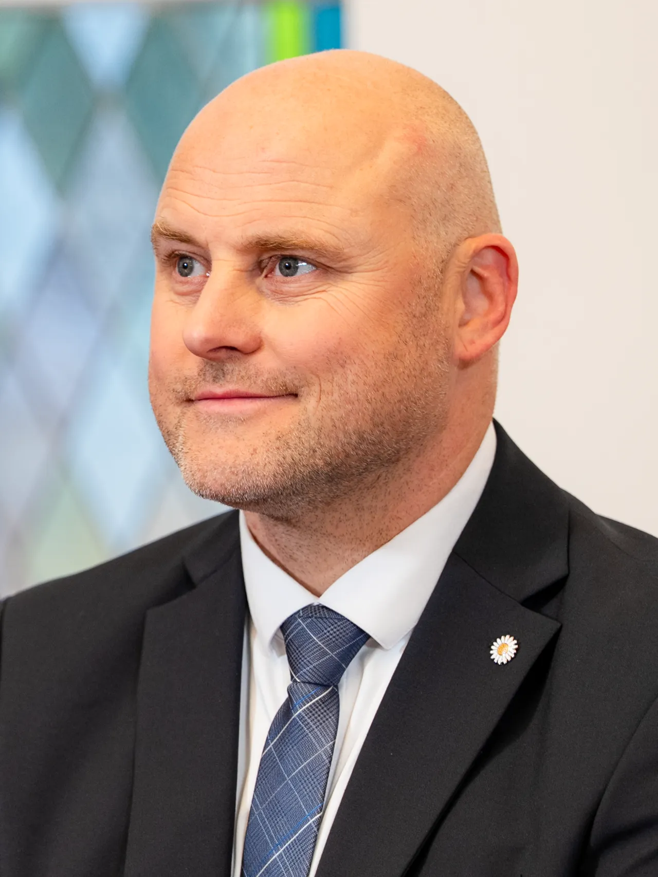 Premier Andris Kulbergs bij de ondertekening van het coalitieakkoord in mei 2026.